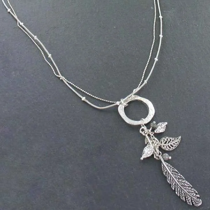 Beaten Ring Necklace With Leaf Charms In Silver Plate