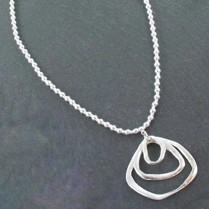 Silver Ball Necklace With Triple Ring Pendant In Silver Plate