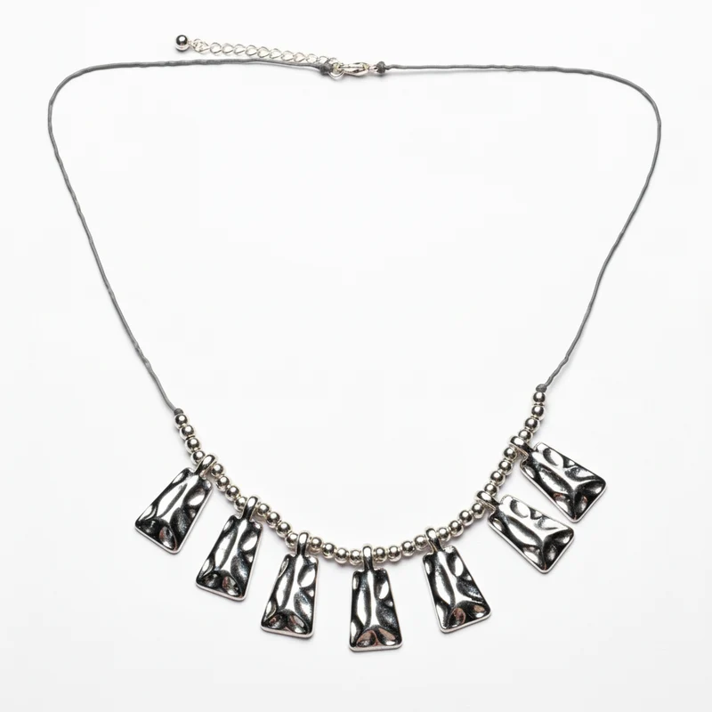 Beaten Fan Necklace In Silver Plate